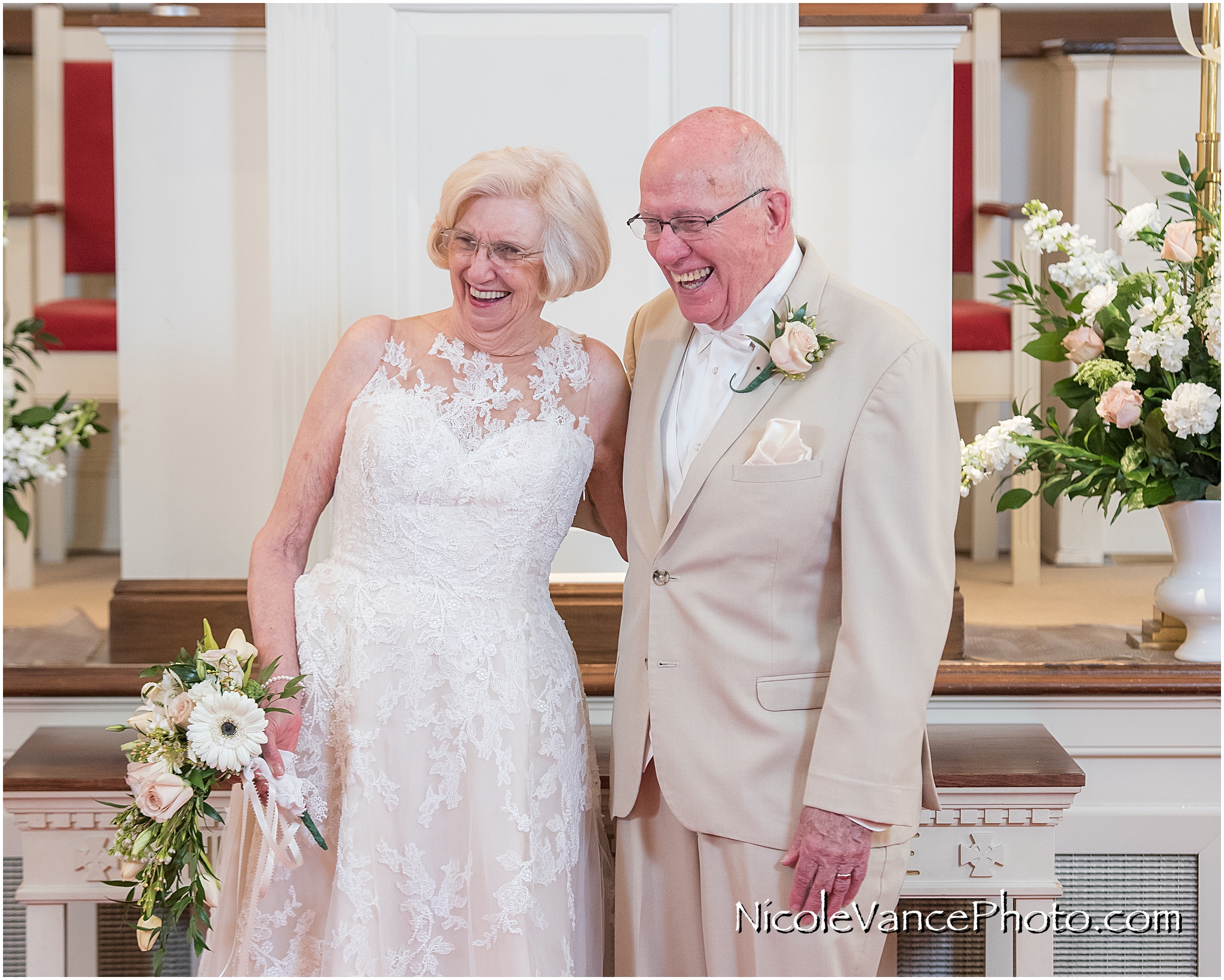 Bride and groom pose at Crestwood Presbyterian Church in Chesterfield VA