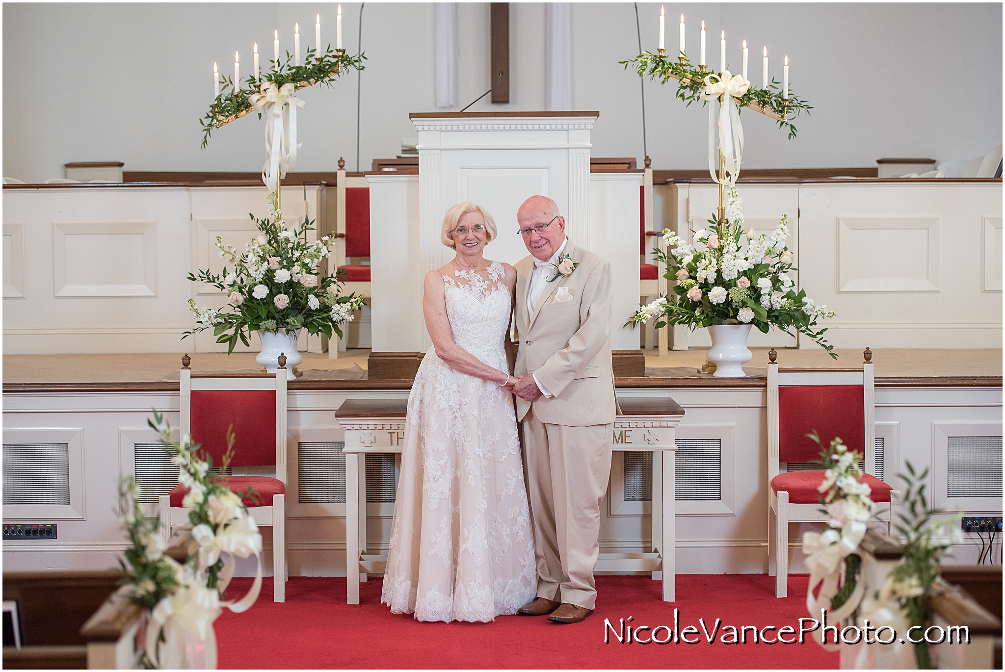 Bride and groom pose at Crestwood Presbyterian Church in Chesterfield VA