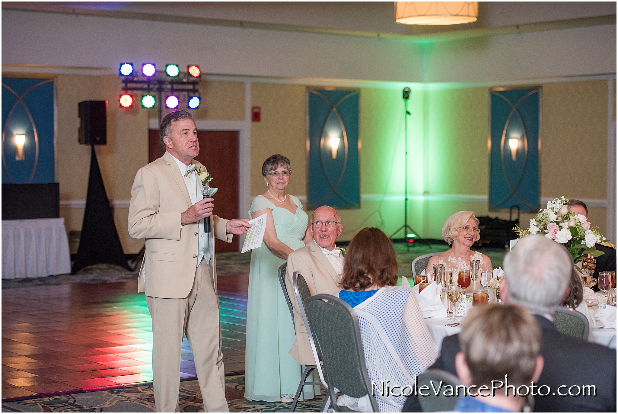 The best man proposes a toast to the bride and groom are announced into the ballroom at the Doubletree by Hilton Richmond-Midlothian.