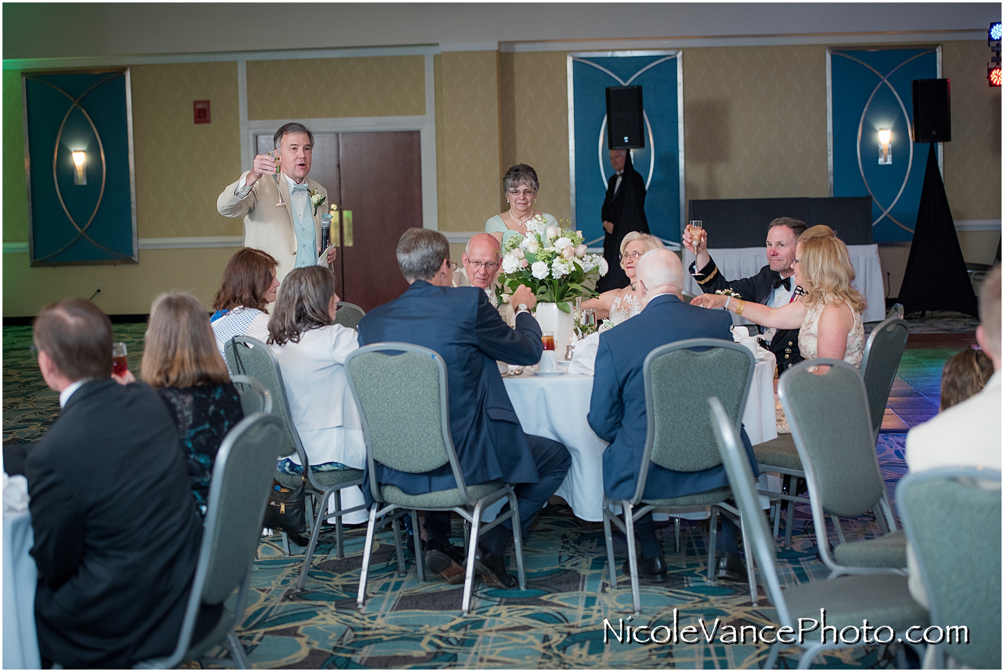 The best man toasts the bride and groom are announced into the ballroom at the Doubletree by Hilton Richmond-Midlothian.